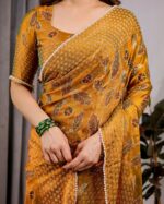 Mustard Yellow Fendy Chiffon Saree with Foil & Block Print, Tassels, and Attached Blouse - Image 2